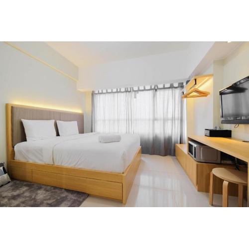 Modern Studio @ Springlake Summarecon Apartment By Travelio