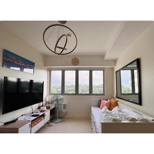 Modern Studio w 55 inches 4K Smart TV, Pool, and More