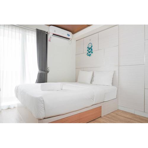 Modern Studio with City View Amethyst Apartment By Travelio