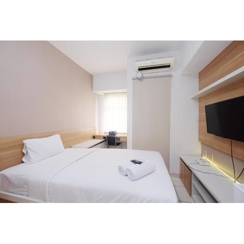 Modern Studio with Great Lake View at Springlake Summarecon Apartment By Travelio