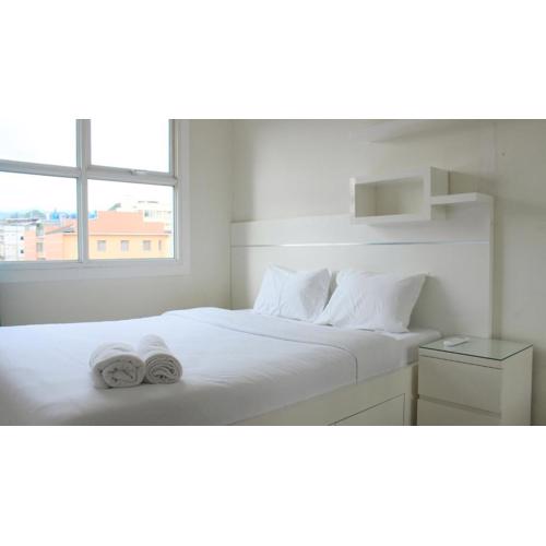 Modest 1BR Apartment at Parahyangan Residence By Travelio