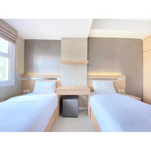 Modest 2BR Apartment at Parahyangan Residence By Travelio