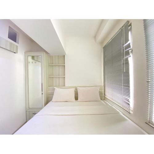 Modest 2BR at Jarrdin Cihampelas Apartment By Travelio