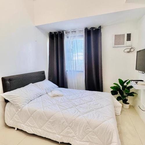 New Condo at Grand Riviera Suites across US Embassy