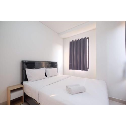 New Furnished and Homey 2BR at Transpark Cibubur Apartment By Travelio