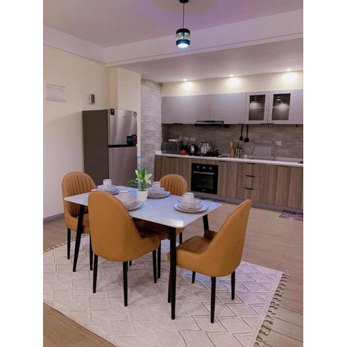 newly furnished apartment with swimming pool, fully equipped gym, private parking space,children playground and unbeatable scenic city views