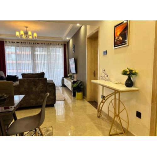 newly furnished two bedroom apartment with swimming pool, fully equipped gym, private parking space, children playground and unbeatable scenic city views in lavington