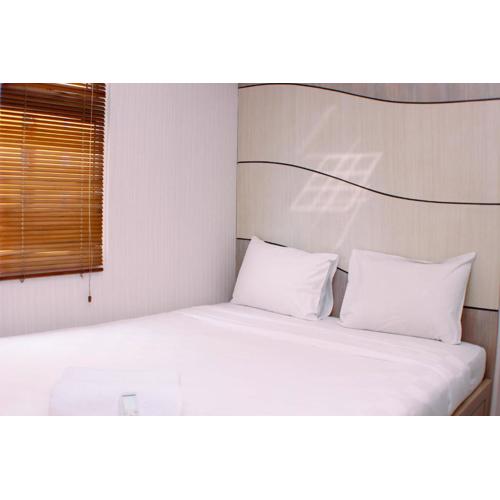 Nice and Best Deal 2BR at Green Pramuka City Apartment By Travelio