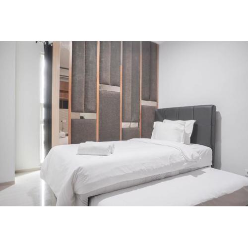 Nice and Comfort 1BR at Citralake Suites Apartment By Travelio