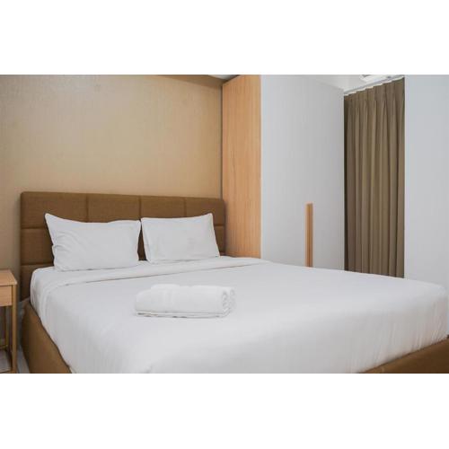 Nice and Comfy 2BR Apartment at M-Town Residence near Summarecon By Travelio