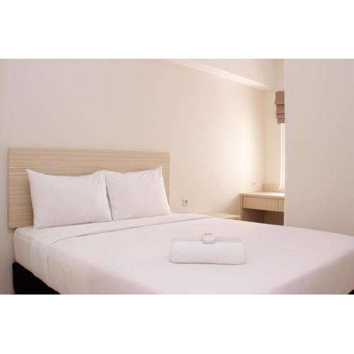 Nice and Comfy 2BR Springlake Apartment near Summarecon Bekasi By Travelio