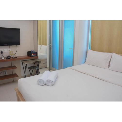 Nice and Comfy Studio Apartment Capitol Park Residence By Travelio