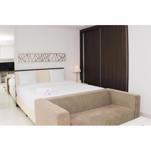 Nice and Comfy Studio Azalea Suites Apartment By Travelio