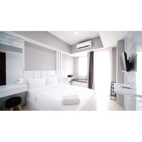 Nice and Comfy Studio Grand Dharmahusada Lagoon Apartment By Travelio