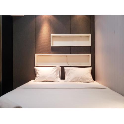 Nice and Cozy Living 2BR Apartment at Green Bay Pluit By Travelio