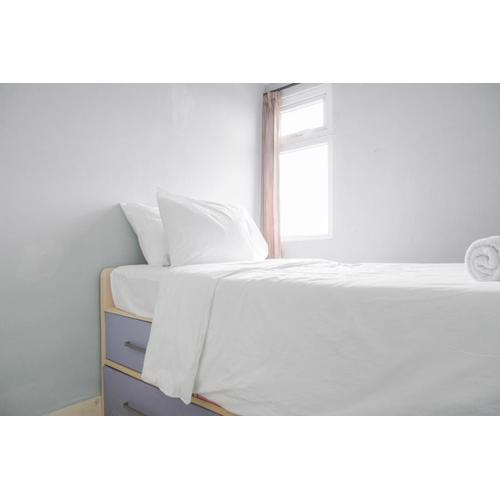 Nice and Cozy Living 2BR at Green Pramuka City Apartment By Travelio