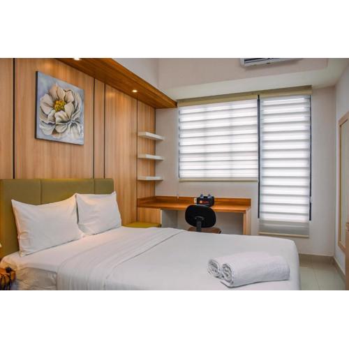 Nice and Cozy Studio at 15th Floor Evenciio Margonda Apartment By Travelio