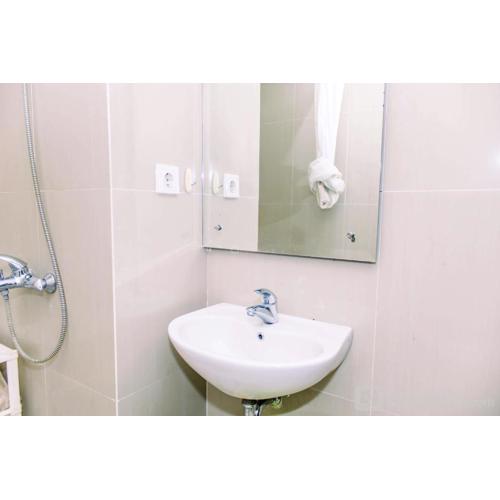 Nice and Cozy Studio at Paramount Skyline Serpong Apartment By Travelio