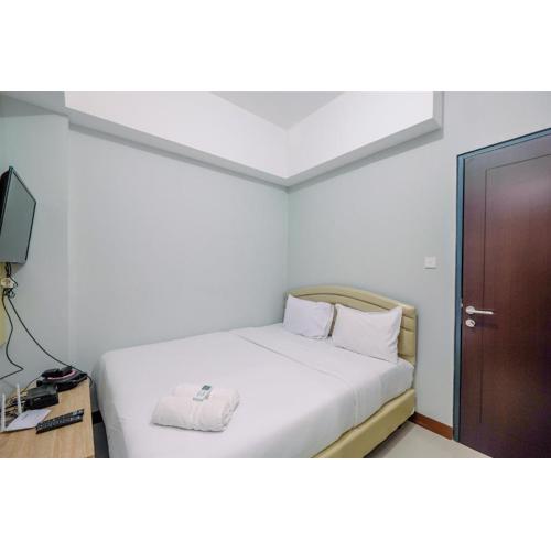 Nice and Elegant 1BR at Royal Heights Apartment By Travelio