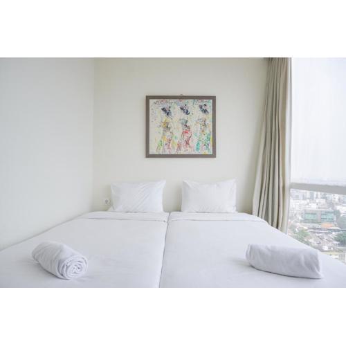 Nice and Elegant 2BR at 26th Floor Menteng Park Apartment By Travelio