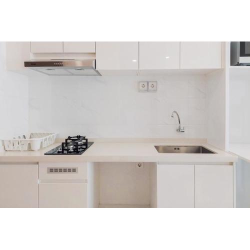 Nice and Elegant 2BR at Sky House BSD Apartment By Travelio