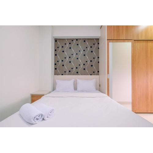 Nice and Elegant 2BR at Transpark Cibubur Apartment By Travelio