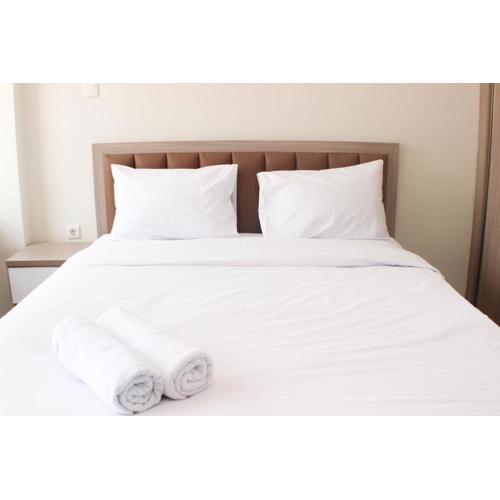 Nice and Elegant Studio Apartment at Mustika Golf Residence By Travelio