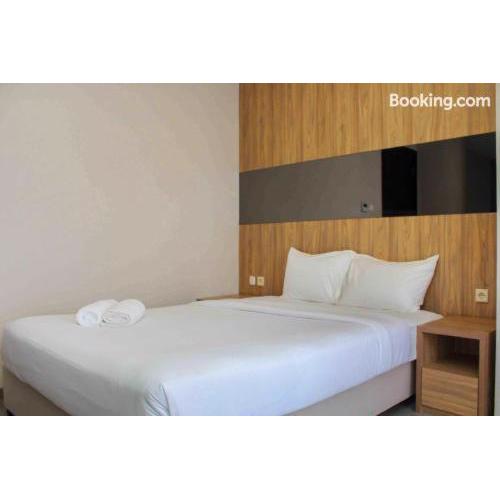 Nice and Enjoy 1BR at Sudirman Suites Apartment By Travelio