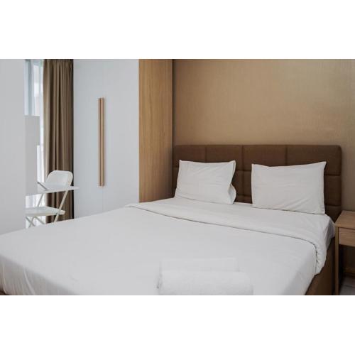 Nice and Fresh 2BR Apartment at M-Town Residence By Travelio