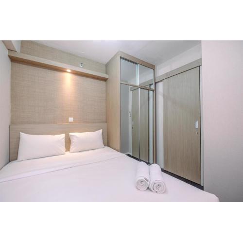 Nice and Fresh 2BR at Bassura City Apartment By Travelio