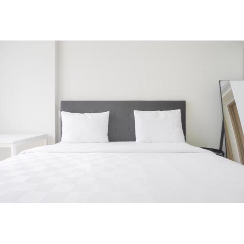 Nice and Homey 1BR at Gold Coast Apartment By Travelio