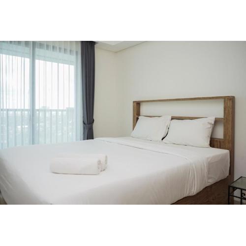 Nice and Homey Studio at Bintaro Embarcadero Apartment By Travelio