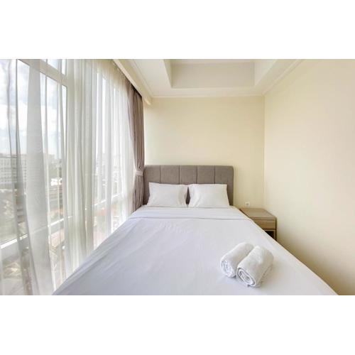 Nice and Minimalist 2BR at Menteng Park Apartment