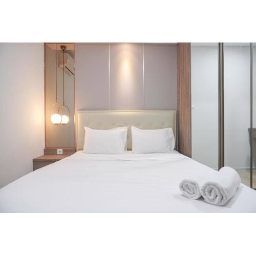 Nice and New 1BR with Office Room at Daan Mogot City Apartment By Travelio