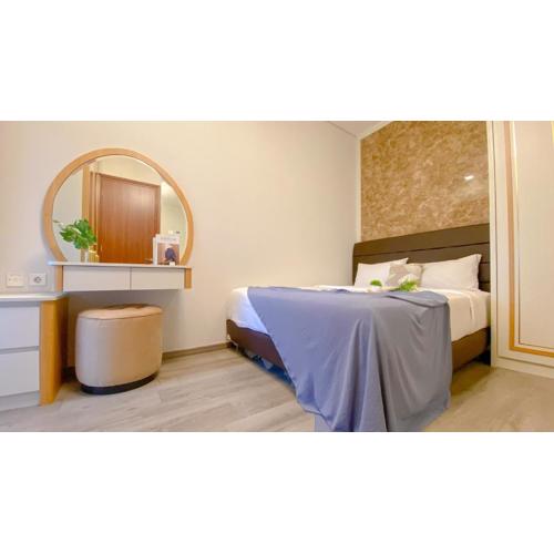 Nice and Restful 2BR at Sudirman Suites Apartment By Travelio