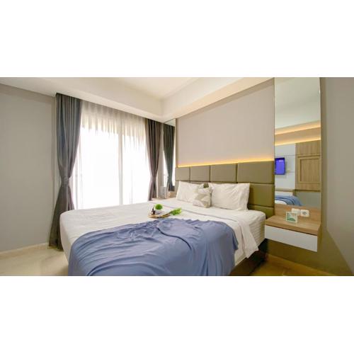 Nice and Restful Studio at Gold Coast Apartment By Travelio