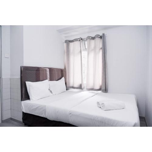 Nice and Simply 2BR at Green Bay Pluit Apartment By Travelio