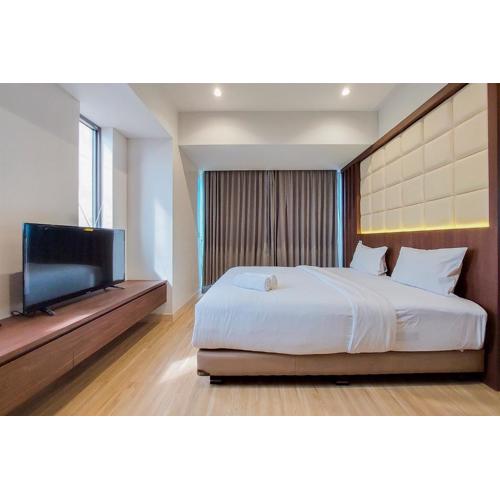 Nice and Spacious 2BR with Extra Room at Branz BSD City Apartment By Travelio