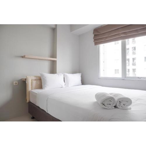 Nice and Strategic 2BR Apartment at Bassura City By Travelio