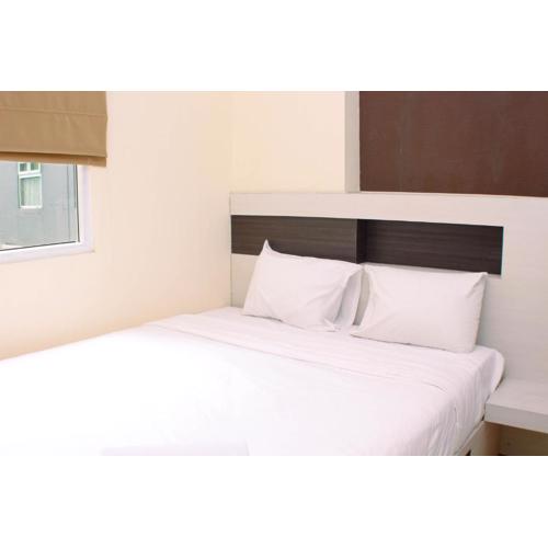 Nice and Strategic 2BR at Green Pramuka City Apartment By Travelio