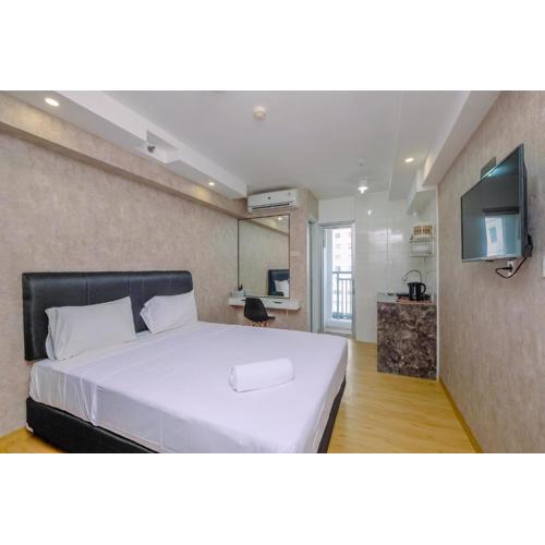 Nice and Strategic Studio at Bassura City Apartment By Travelio