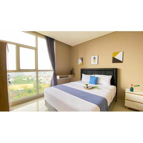 Nice and Wonderful 2BR Ciputra International Apartment By Travelio