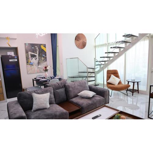 Noir Haven Bold 2BR Duplex in Oasis - Chic Retreat Near Masdar Park & City Centre