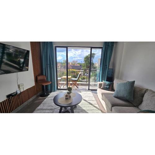 Oasis Kile- Modern 1-BR, King bed, Gym, Coffee Hse