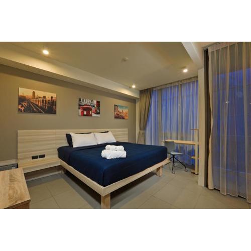 Oceanstone by Holy Cow, studio, next building view