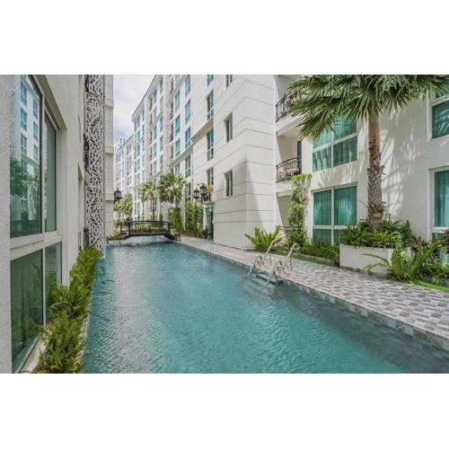 Olympus city garden direct pool access apartment by Sankalp