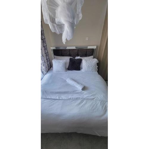 One bedroom at Tsavo fedha