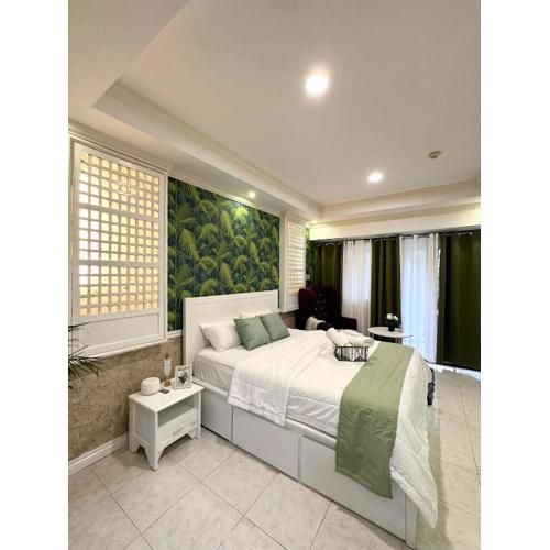 One Bedroom with Balcony by Christine Suites PH in Greenbelt Radisson