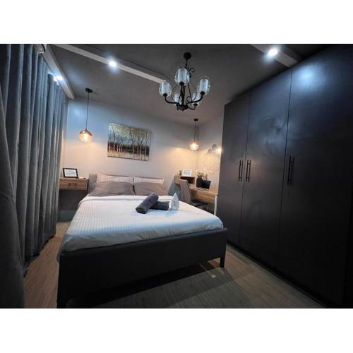 One Oasis Cozy condo beside Sm Ecoland