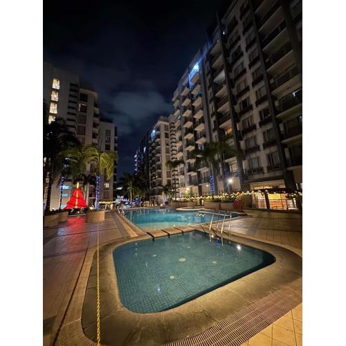 One Palm Tree Villas Studio w fast WiFi, across from NAIA Terminal 3